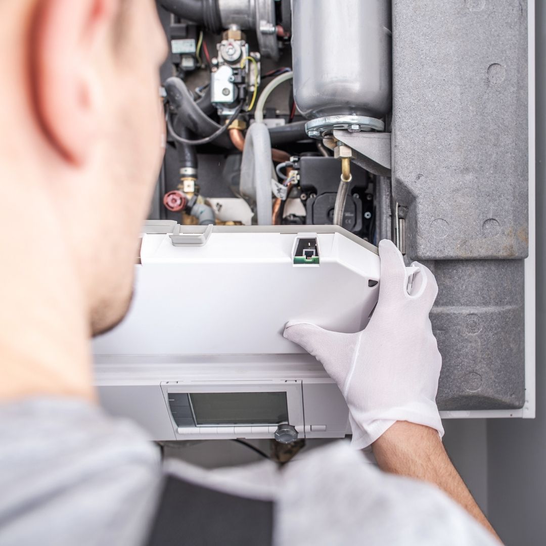 HVAC tech addressing heater system