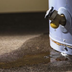 Water leaking from the bottom of a water heater