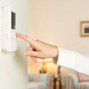 Pressing a thermostat